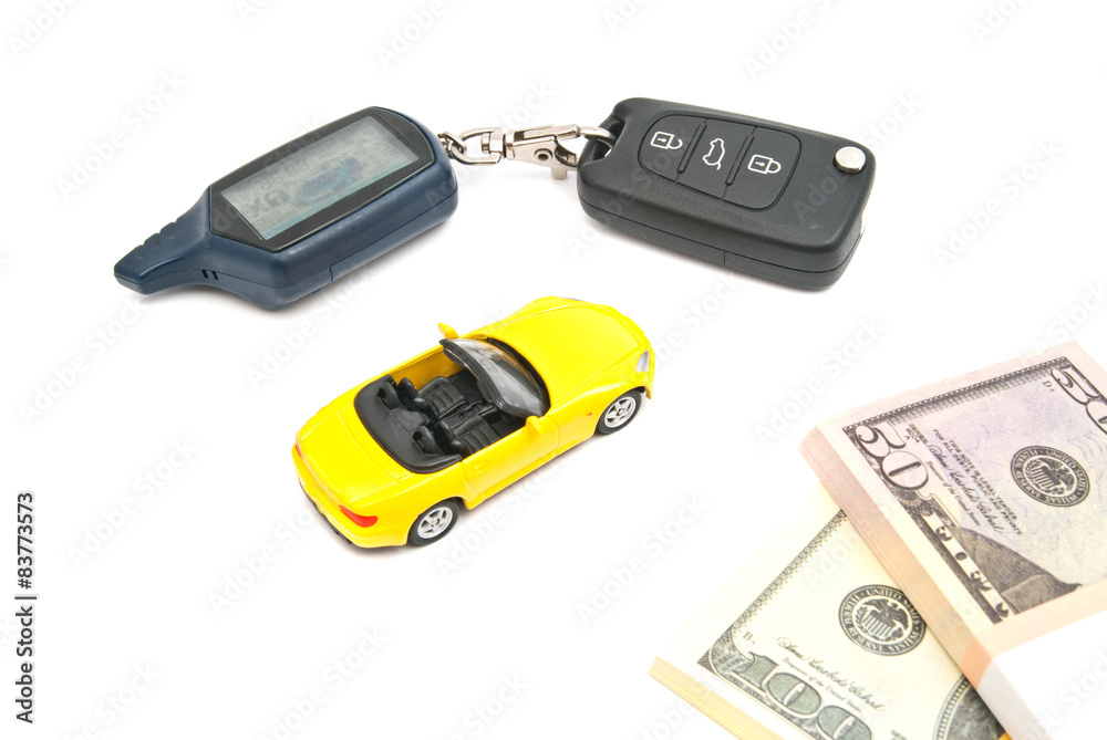 yellow car, keys and banknotes on white yellow car, keys and banknotes on white