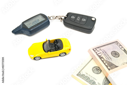 yellow car, keys and banknotes