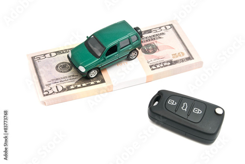 car keys, green car and money