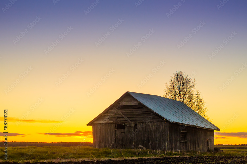 Barn House Against The Spring Sunset