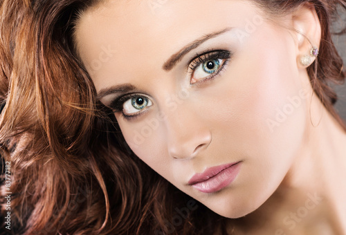 Wallpaper Mural Brunette with beautiful makeup on a dark background Torontodigital.ca