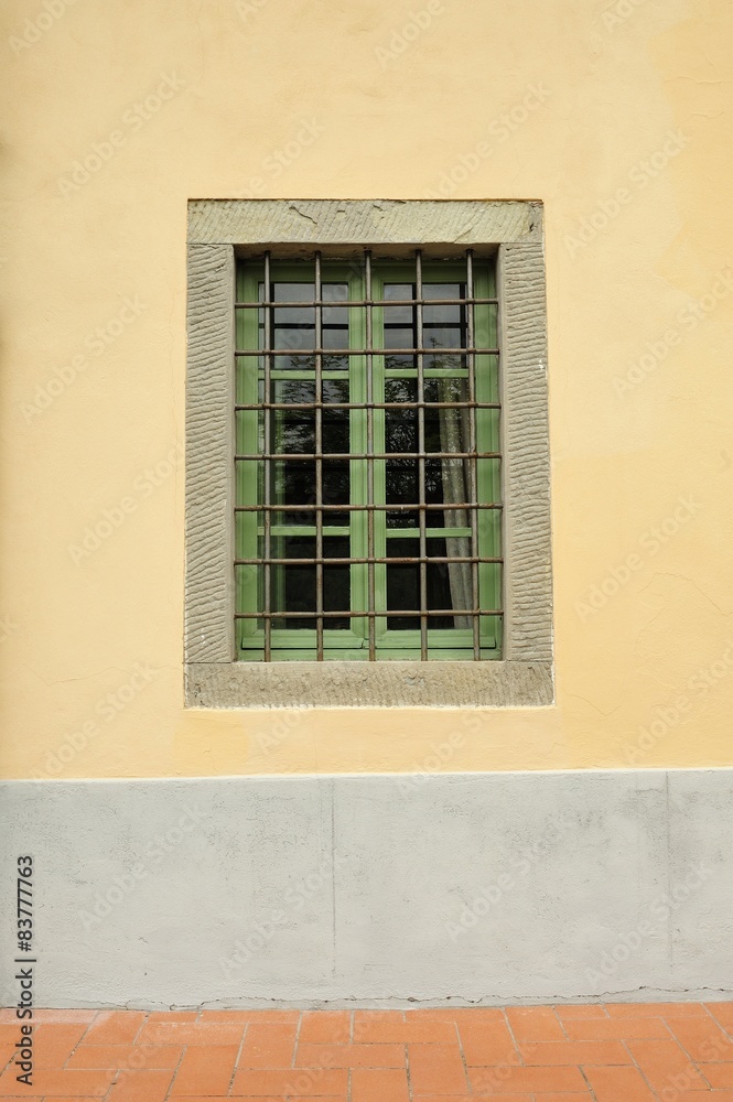 Old italian window with bars Old italian window with bars
