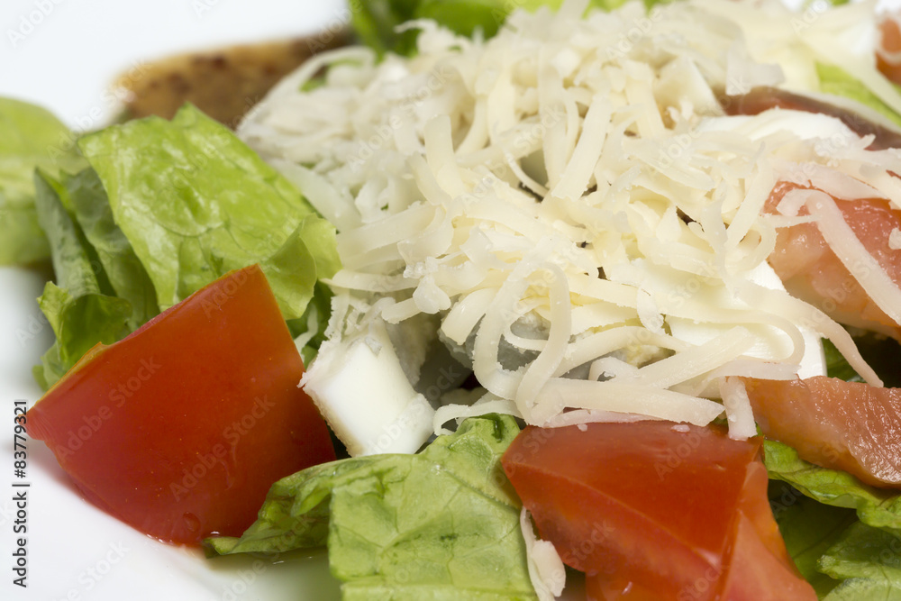 Closeup of salad with vegetables and fish