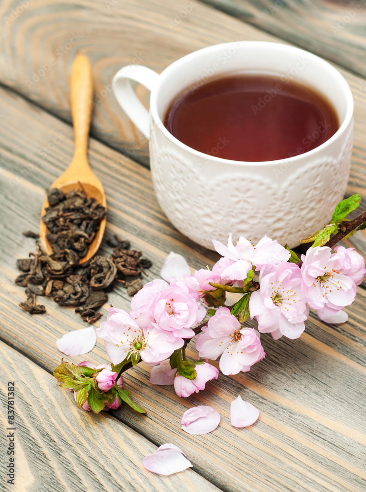 Cup of tea and sakura blossom Cup of tea and sakura blossom