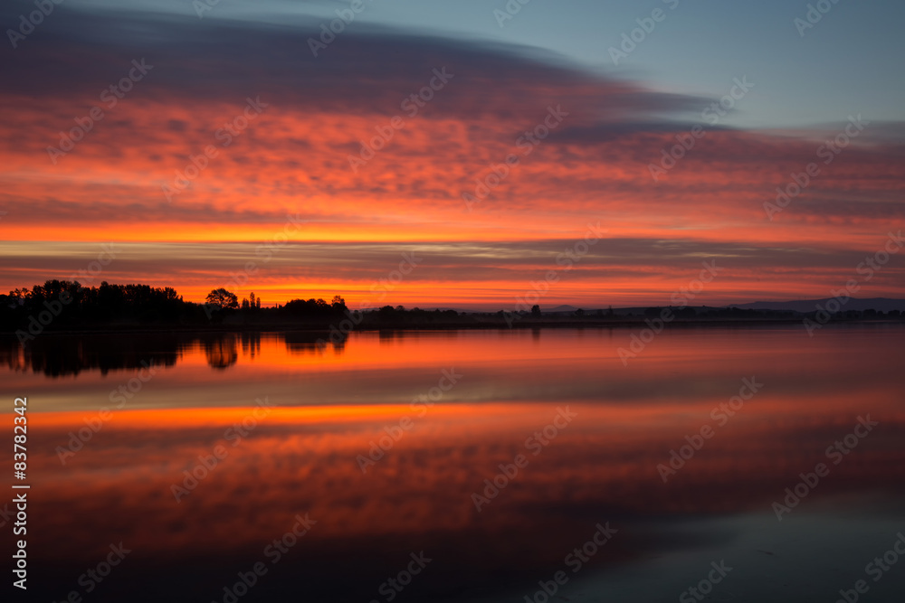 Reflection of  Burning Sky During Sunrise/Sunset
