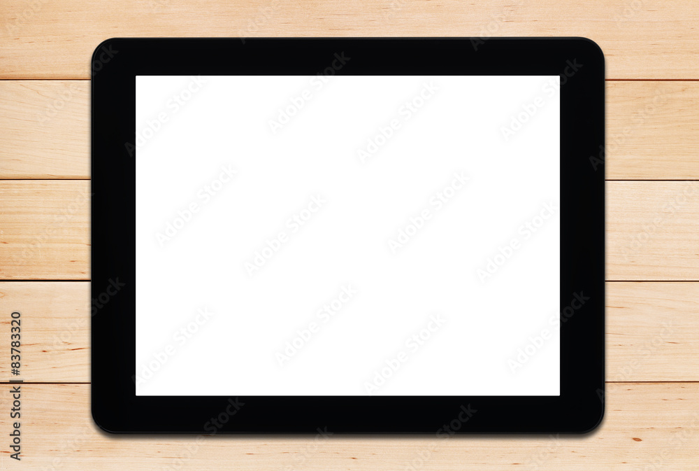 Tablet PC on a wooden table Tablet PC on a wooden table
