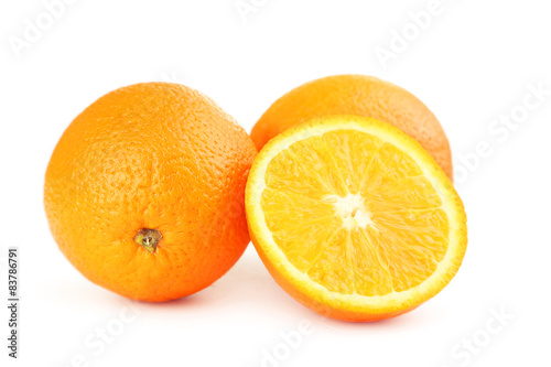 Ripe oranges isolated on white
