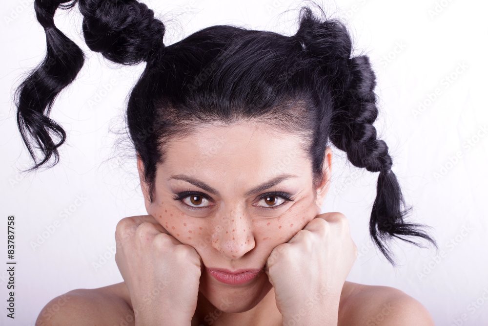 Fototapeta premium Beautiful brunette woman with beauty long curly hair