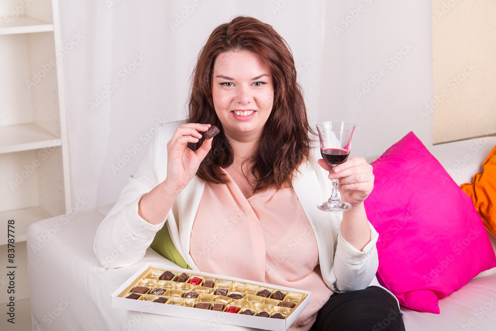 Woman has a moment of pleasure with sweets Woman has a moment of pleasure with sweets