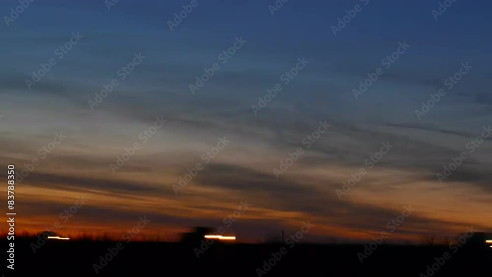 Calm Dusk Sky over Hectic Highway Traffic Calm Dusk Sky over Hectic Highway Traffic