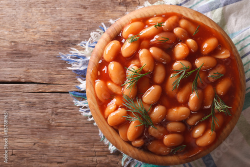 beans in tomato sauce with dill horizontal top view
