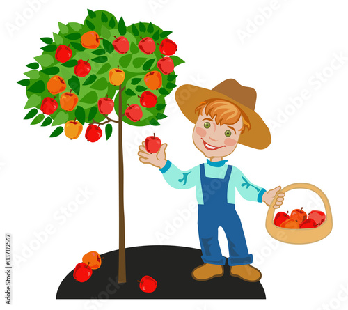 child in garden with crop of red apples