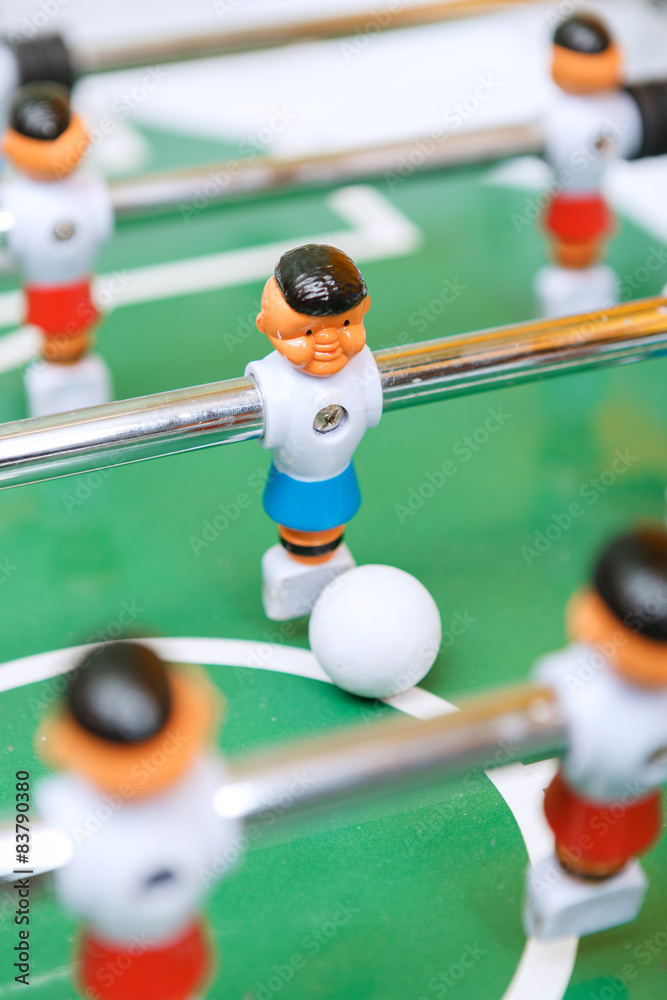 Fototapeta premium Happy friends playing table hockey