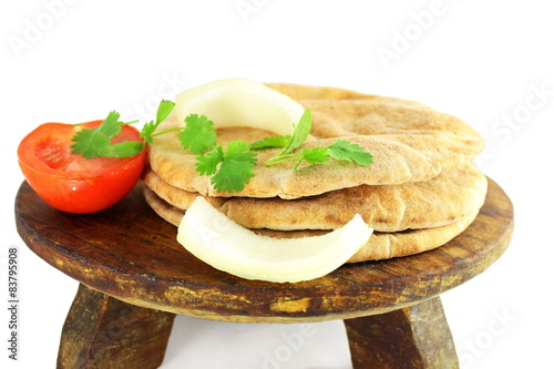 pita flat bread or nan closeup in pure white background