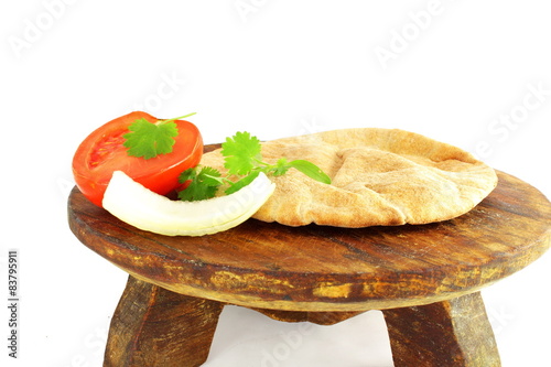 pita flat bread or nan in pure white background