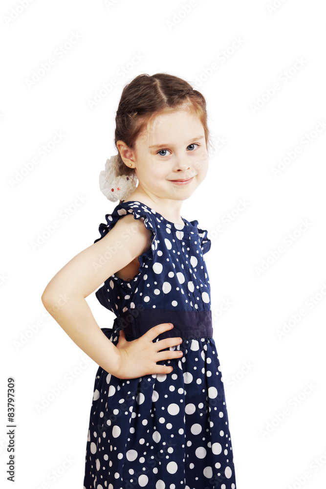 Little girl in a blue dress with polka dots Little girl in a blue dress with polka dots