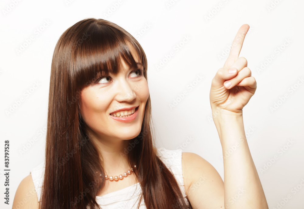 young woman with her finger up 