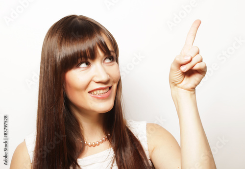 young woman with her finger up 