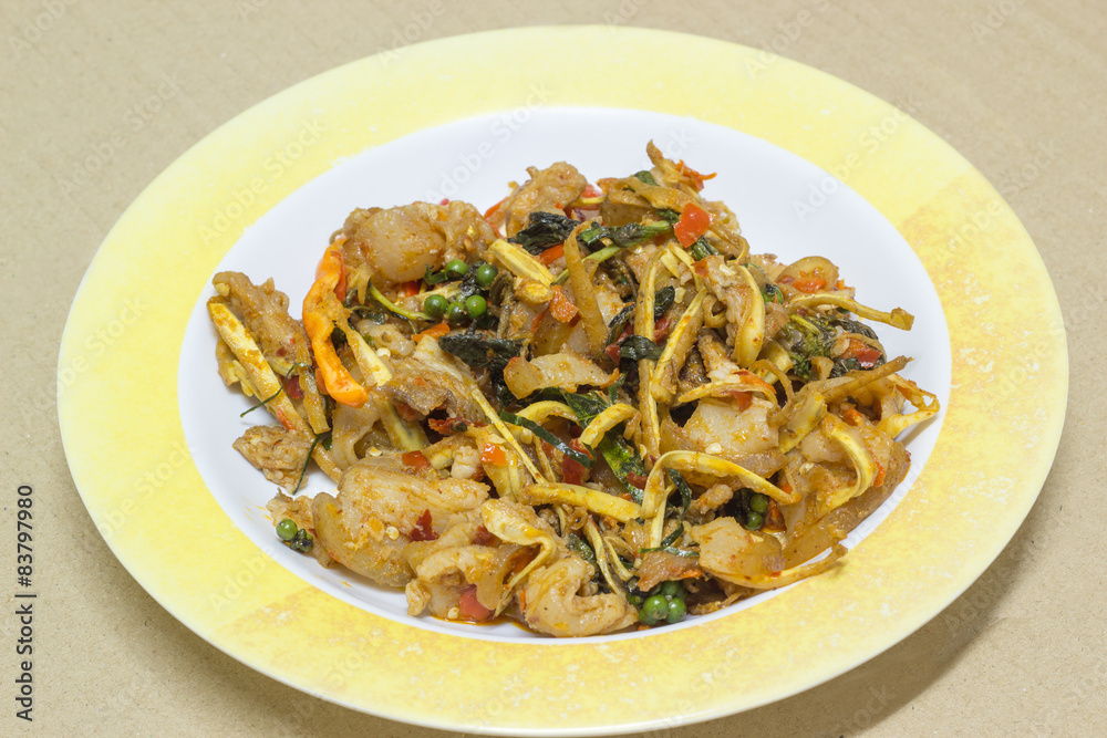 Stir Fried Wild Boar with Red Curry in plastic dish on card boar Stir Fried Wild Boar with Red Curry in plastic dish on card boar