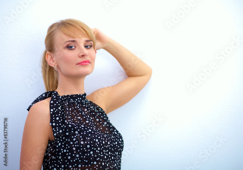 Portrait of an attractive young woman standing 