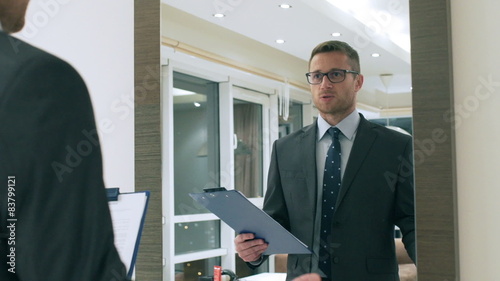 Businessman training speech in front of the mirror
