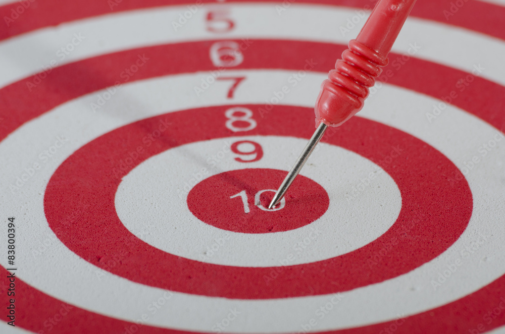 Red target with dart Red target with dart