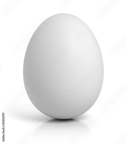 Foto Chicken egg on white