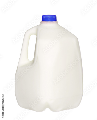 gallon Milk Bottle with blue Cap Isolated on White Background. photo