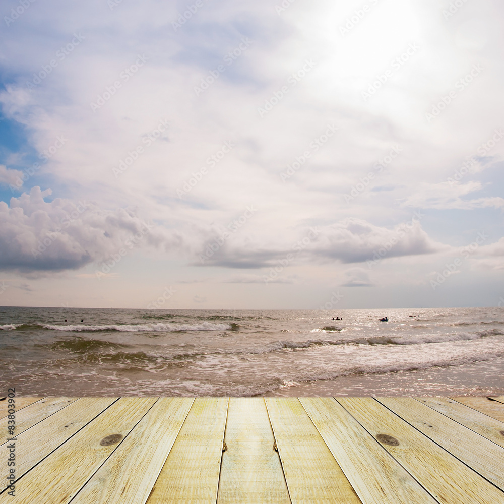 Wood terrace on blue sea & sky background