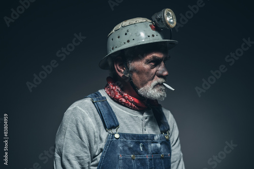 Elderly Gold Miner with Smoke Facing Right