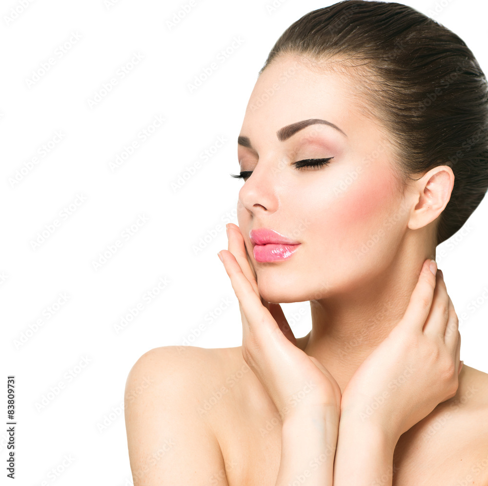 Beauty portrait. Beautiful spa woman touching her face