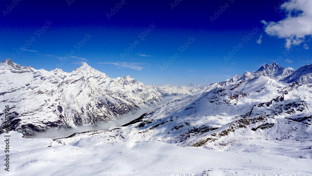 snow mountains and blue sky