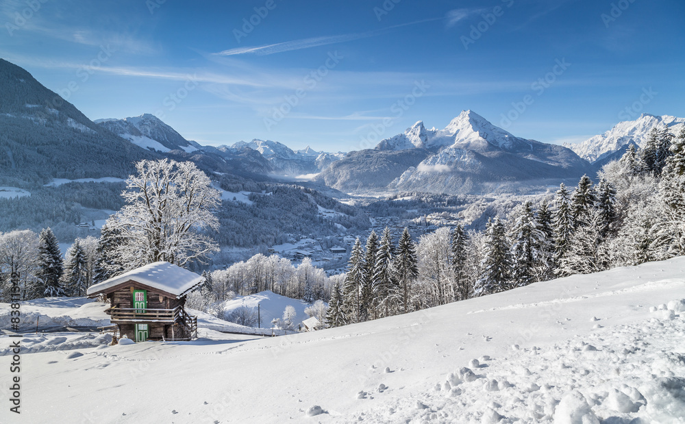 Idyllic winter landscape the Alps with mountain chalet