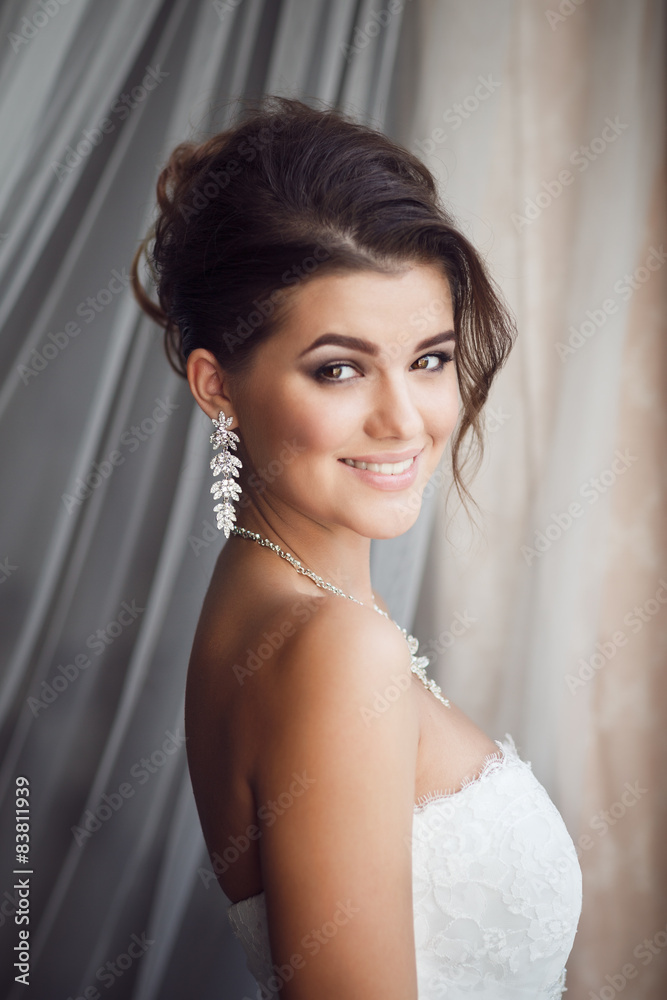 Beauty portrait of young bride. Perfect makeup and hairstyle.
