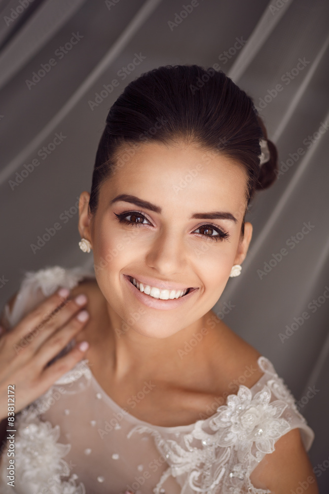 Beauty portrait of young bride. Perfect makeup and hairstyle. Beauty portrait of young bride. Perfect makeup and hairstyle.