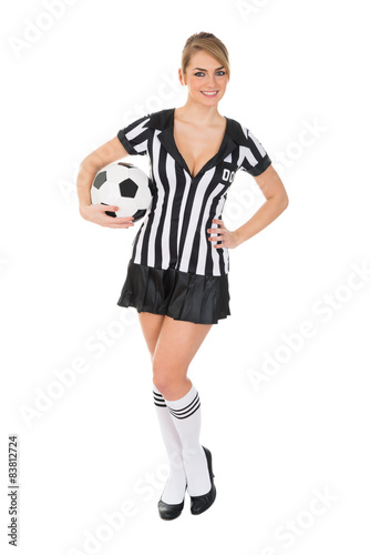 Female Referee Holding Football In Hand