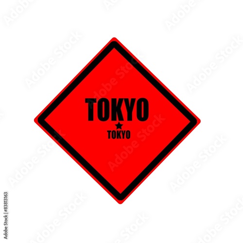 TOKYO black stamp text on red background