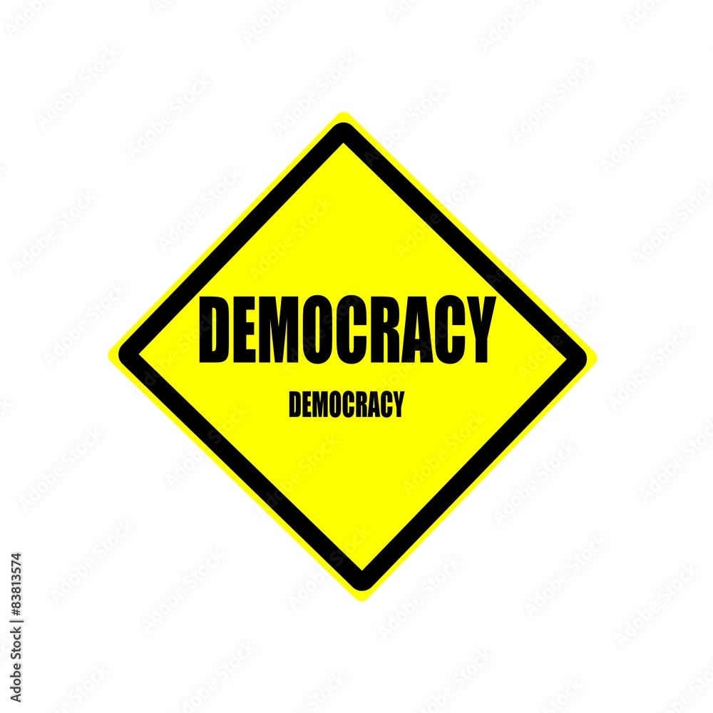 Democracy black stamp text on yellow background Democracy black stamp text on yellow background