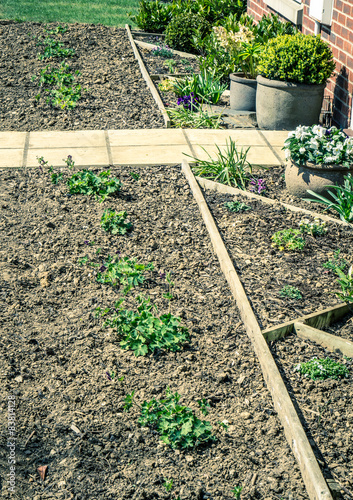 Flower beds and plant pots in early spring