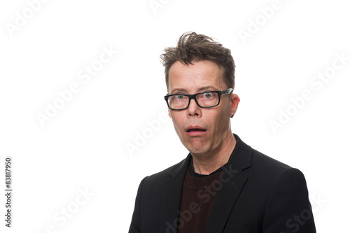 Shocked Businessman with Glasses Looking at Camera