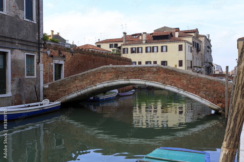 ancient red brick bridge in Venice