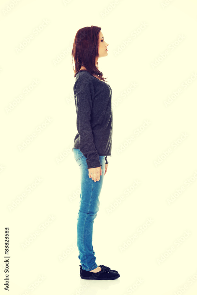 Woman standing from one side Woman standing from one side