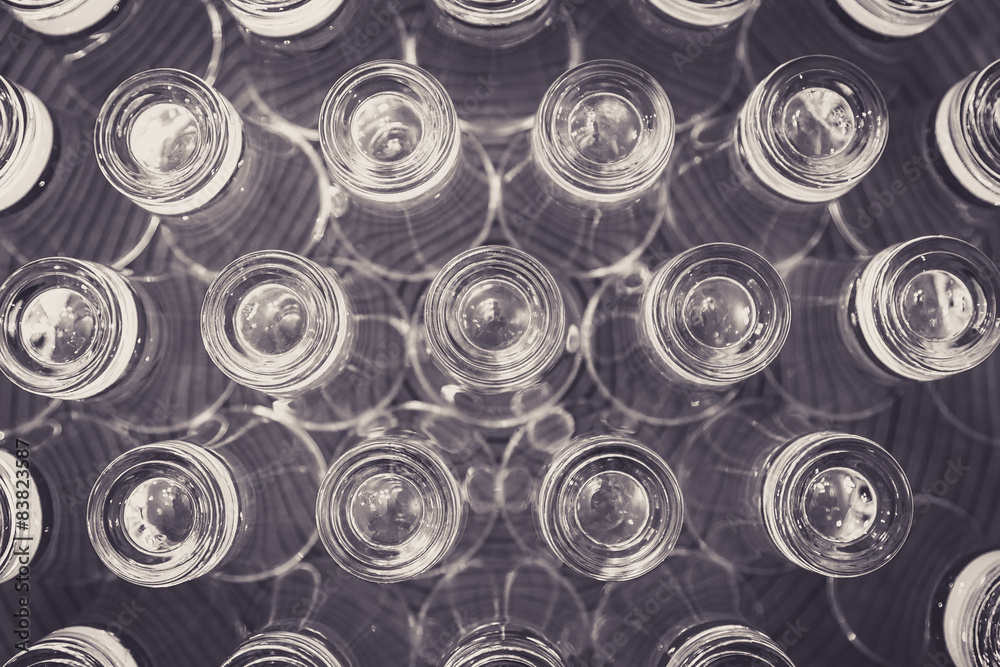 inverted shot glasses on a plate background edited matte b&w inverted shot glasses on a plate background edited matte b&w