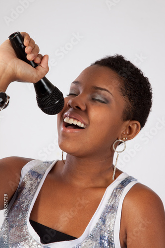 Pretty black woman with a microphone