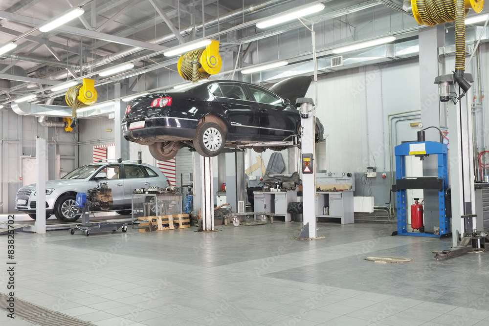 Cars in a dealer repair station in Moscow, Russia Cars in a dealer repair station in Moscow, Russia