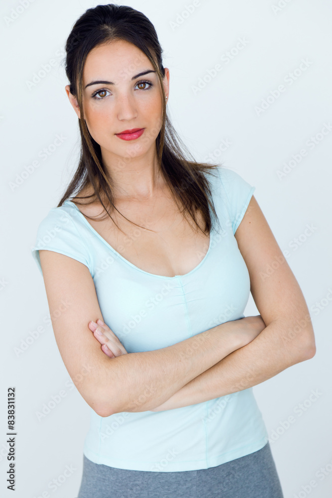 Beautiful young woman looking at camera. Isolated on white. Beautiful young woman looking at camera. Isolated on white.