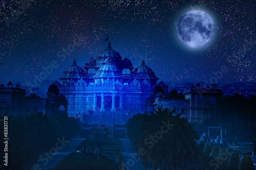 India. Delhi. Akshardham by the light of  full Moon.  photo