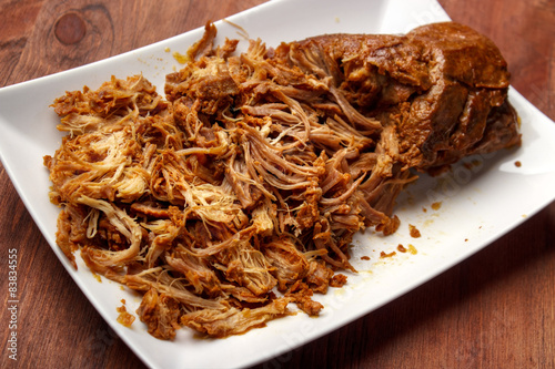 Oven made warm pulled pork , partially ripped  photo