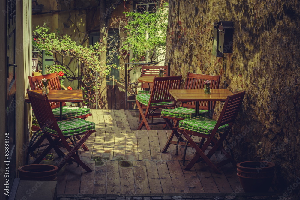 Homey outdoor cafe terrace in a shady place