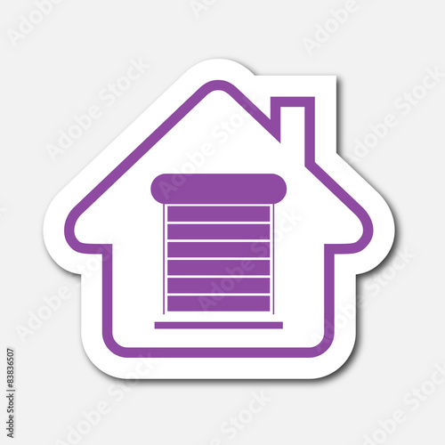 Logo maison et volet roulant.